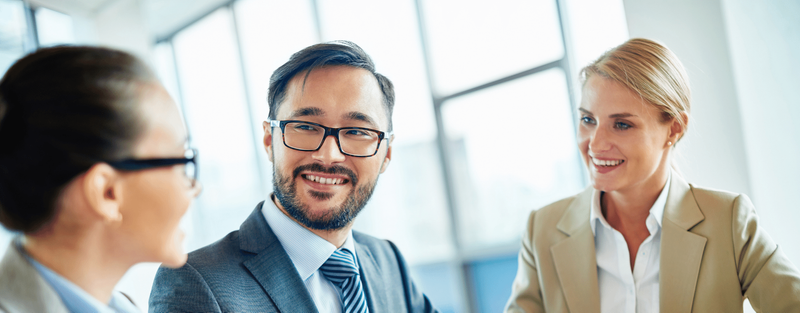 A smiling businessman in an office