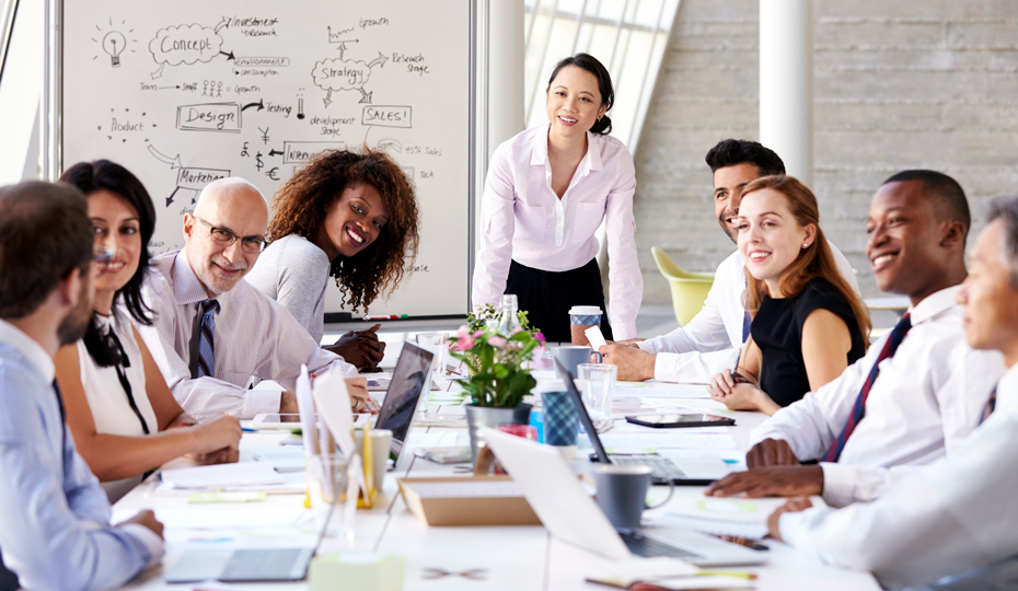 A business meeting being held in a boardroom