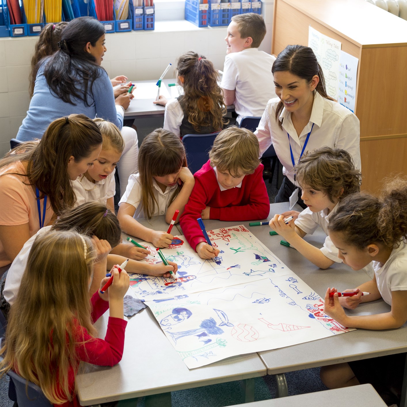 Children drawing in a classroom