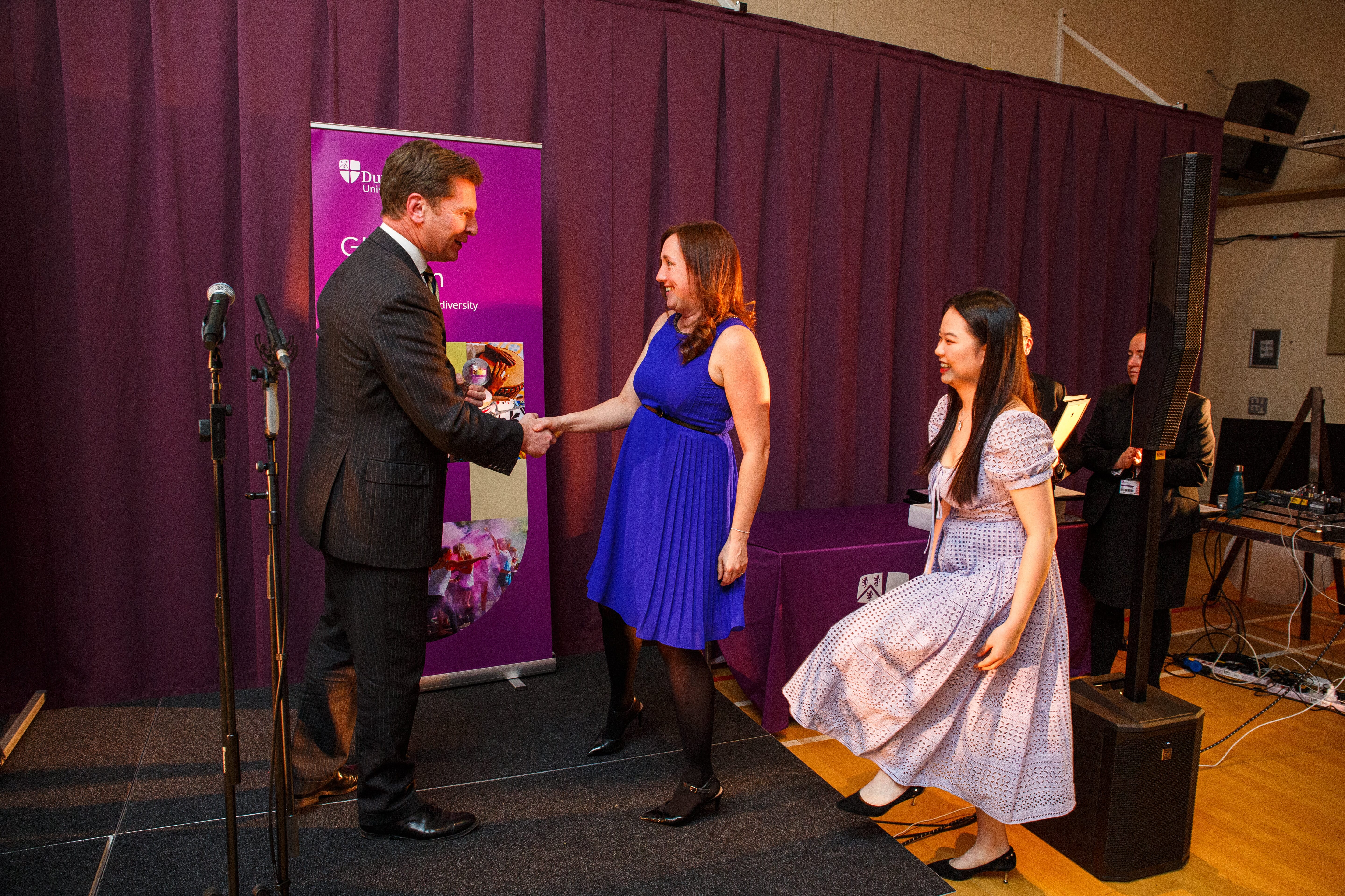 Katie Binks and Louise Jiayu Liu of DUSVO collecting the Global Student Experience Award