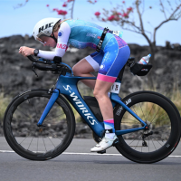 Grace Gilbert cycling in a triathlon