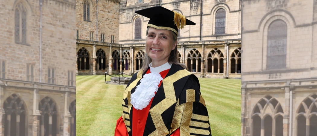 Dr Fiona Hill in academic dress at Durham Cathedral