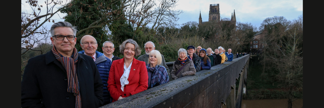 People on Kingsgate Bridge with Durham Cathedral in the background