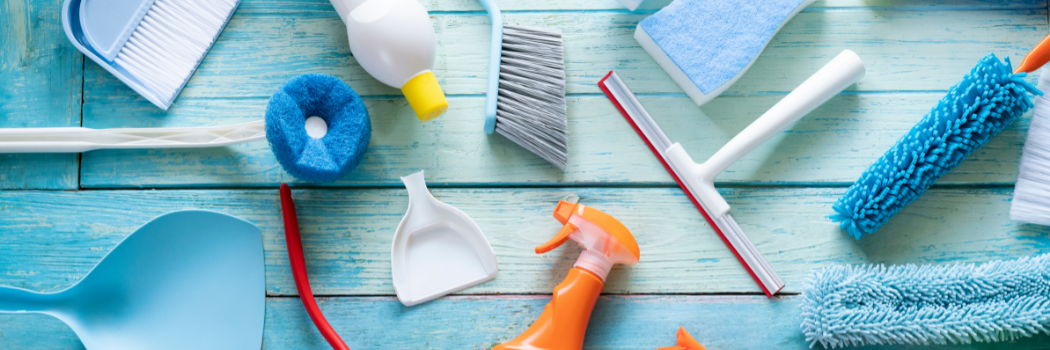 A range of household cleaning products such as pan and brush and sponges