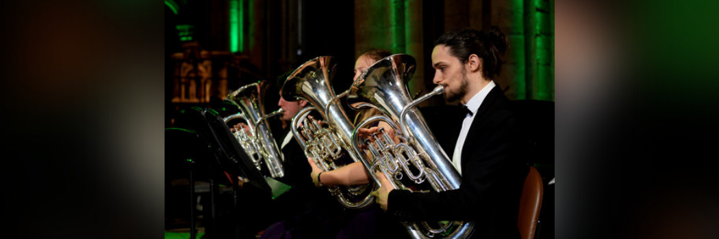 Students playing in brass band