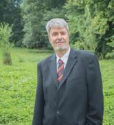 Principal Joe Elliott standing outside