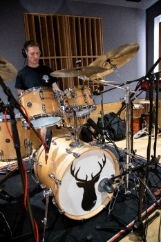 A student playing drums