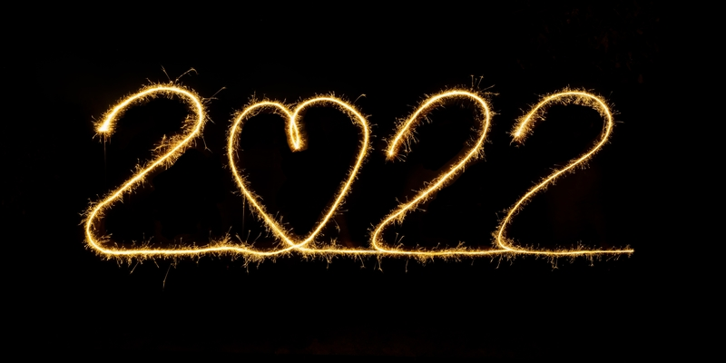 2022 written in gold on a black background. The 