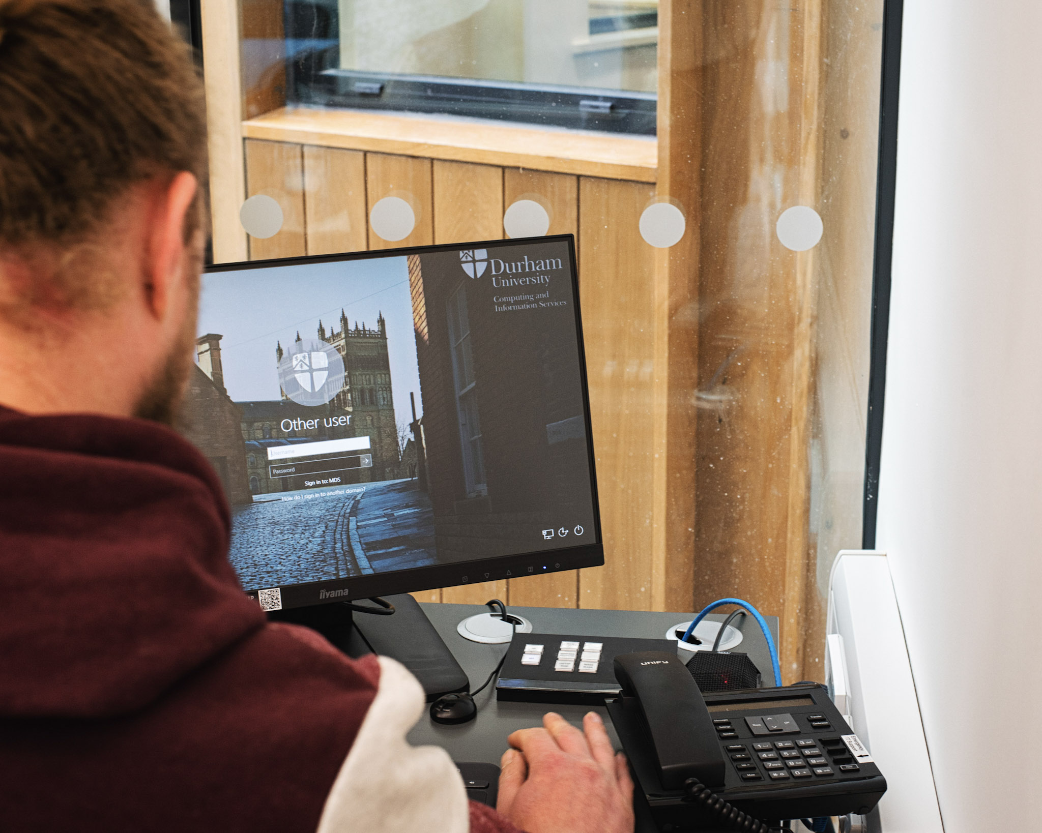 Student logging onto a Durham University computer