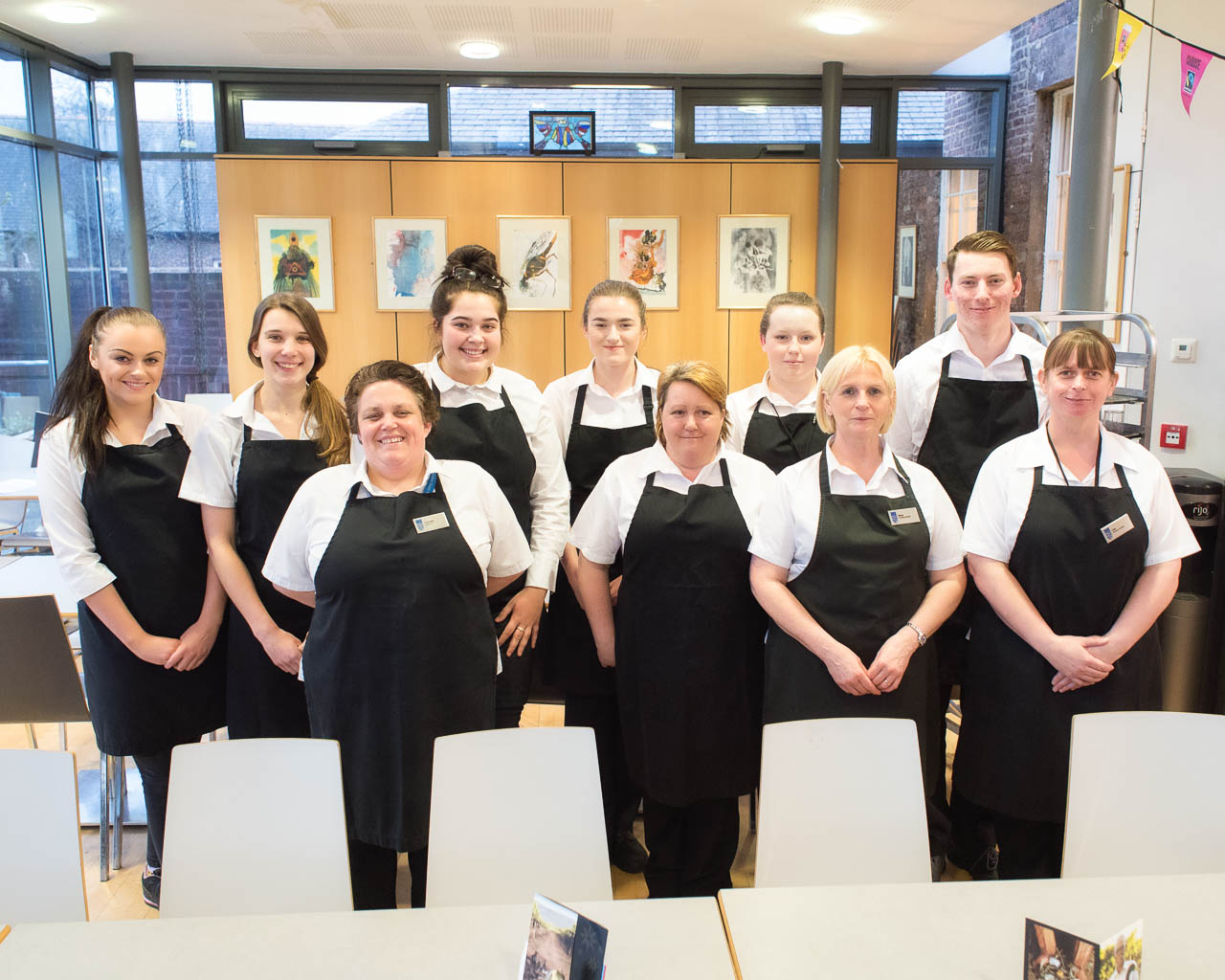 Catering team in black aprons