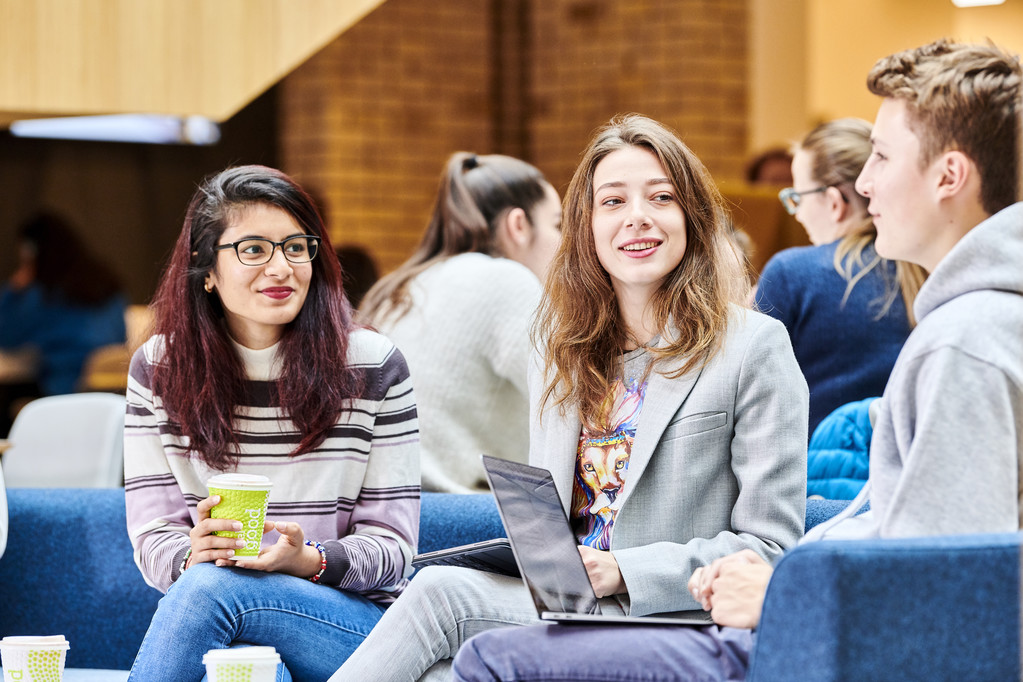 3 students talking