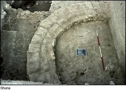 Circular stone building under excavation