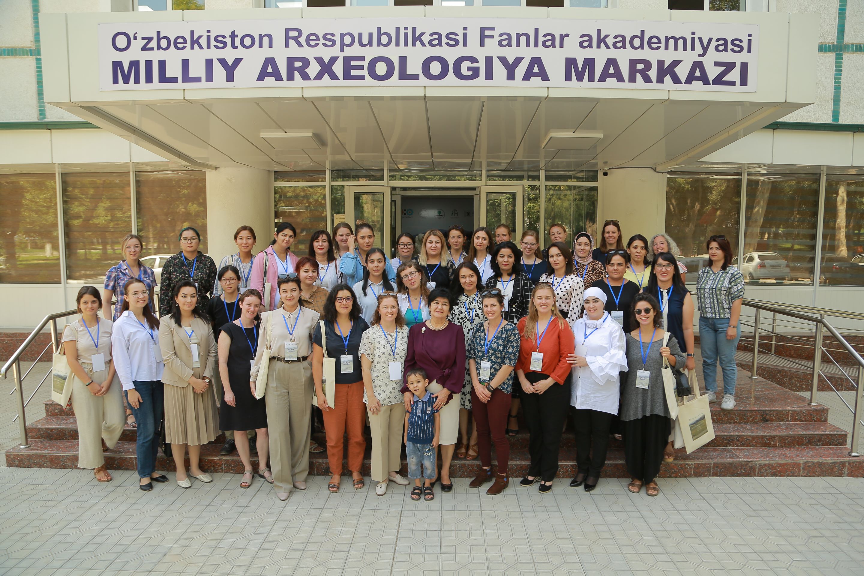 Group photo in front of some steps outside a building, showing attendees at the first Steppe Sisters Early Career Conference in Tashkent in September 2022