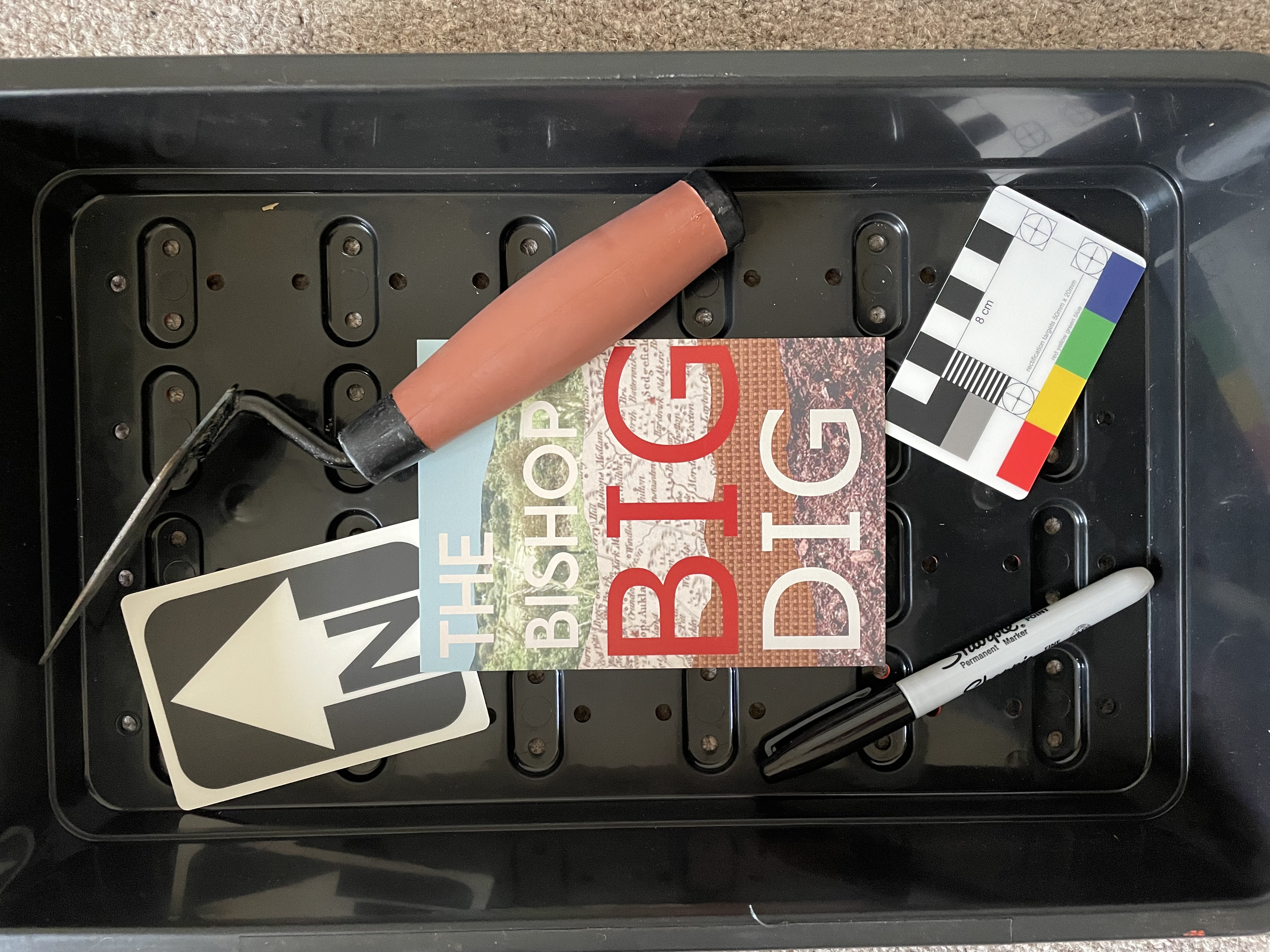 A collection of tools used for archaeology, photographed as publicity for the BISHOP BIG DIG