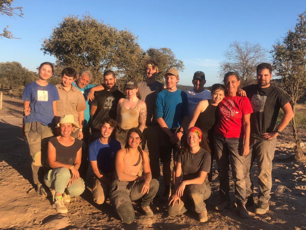 Group photo during golden hour of the Las Capellanías archaeological team