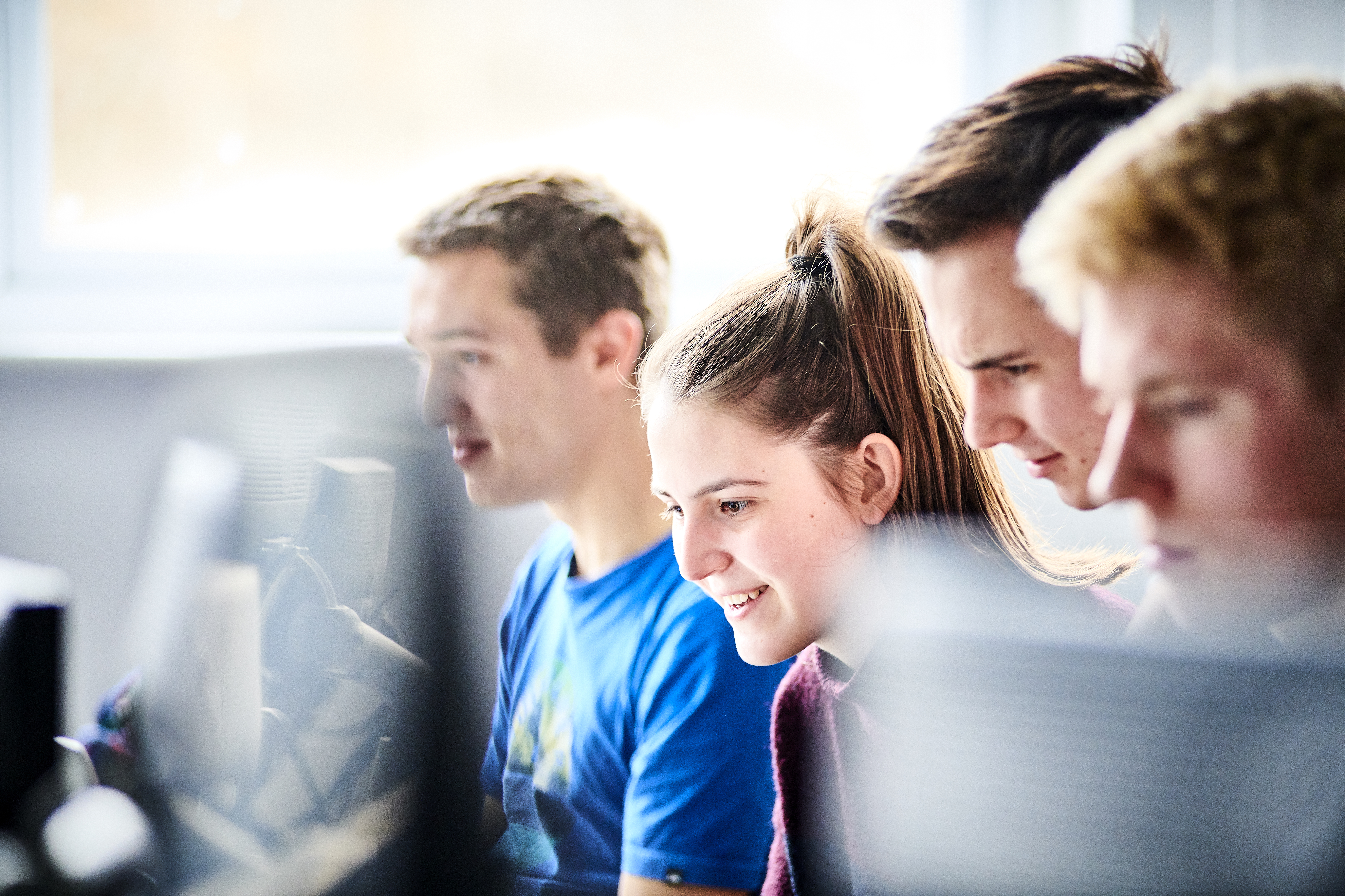 Students working at computer screens