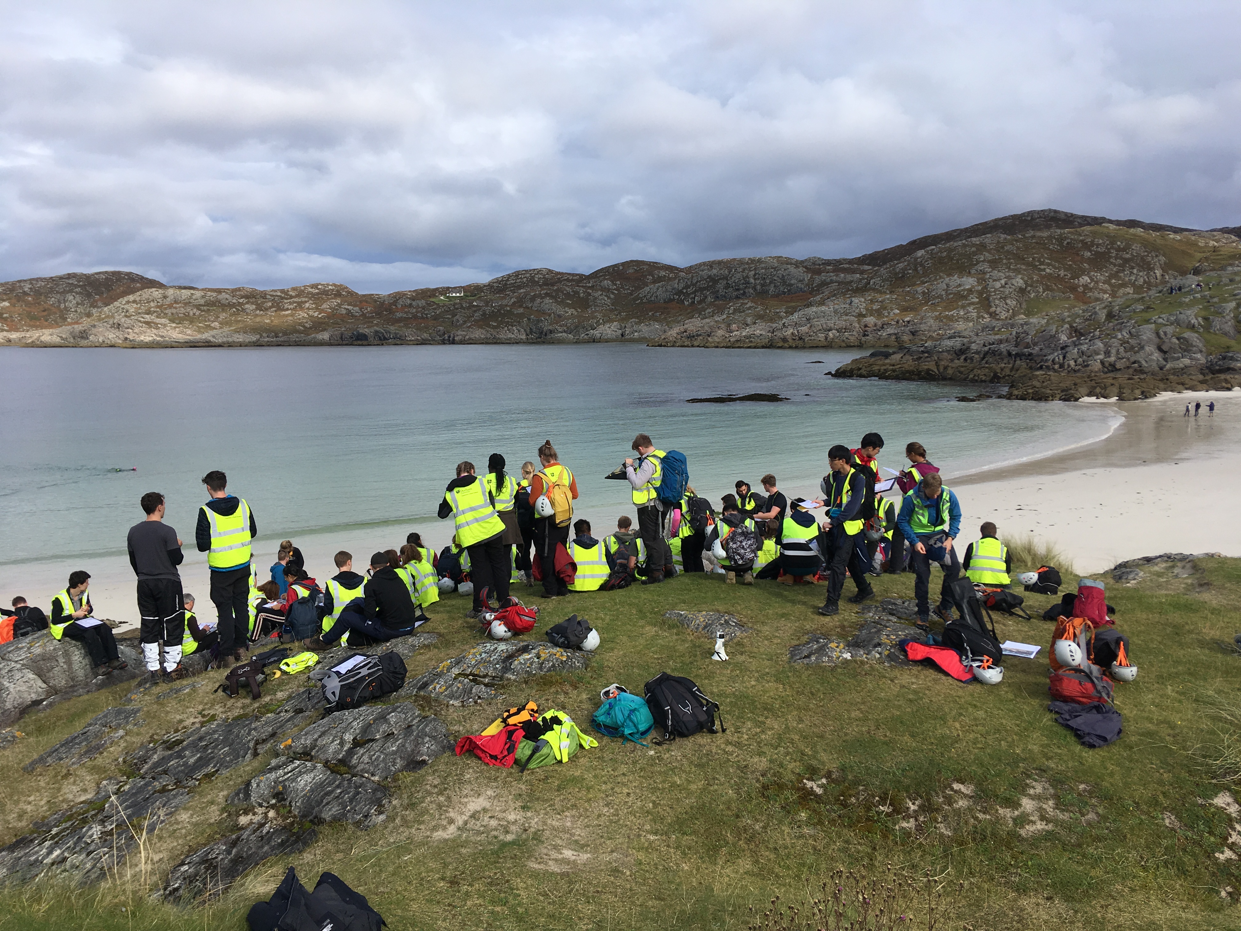 students on a field trip on a beach