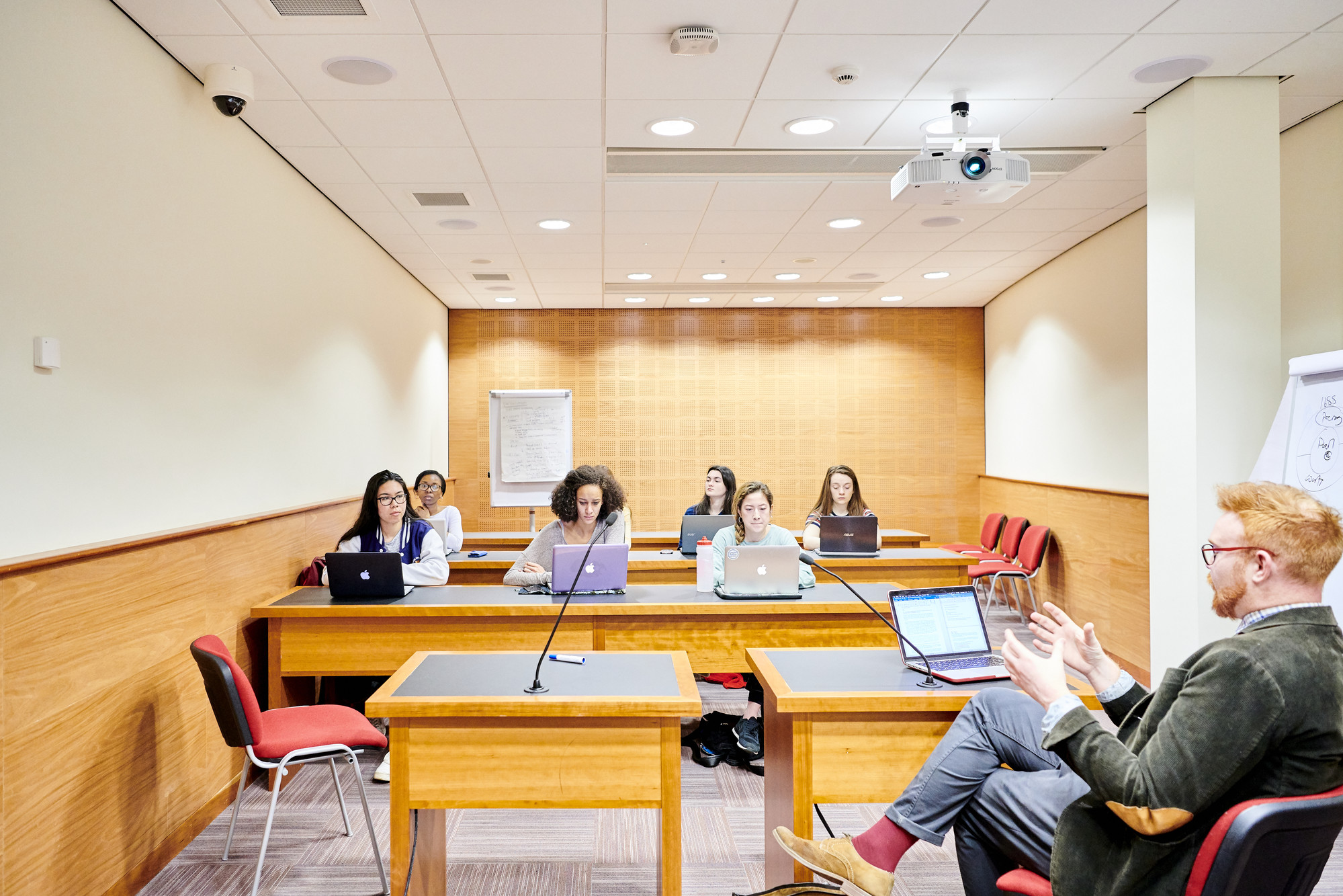 Lecturer and students in classroom