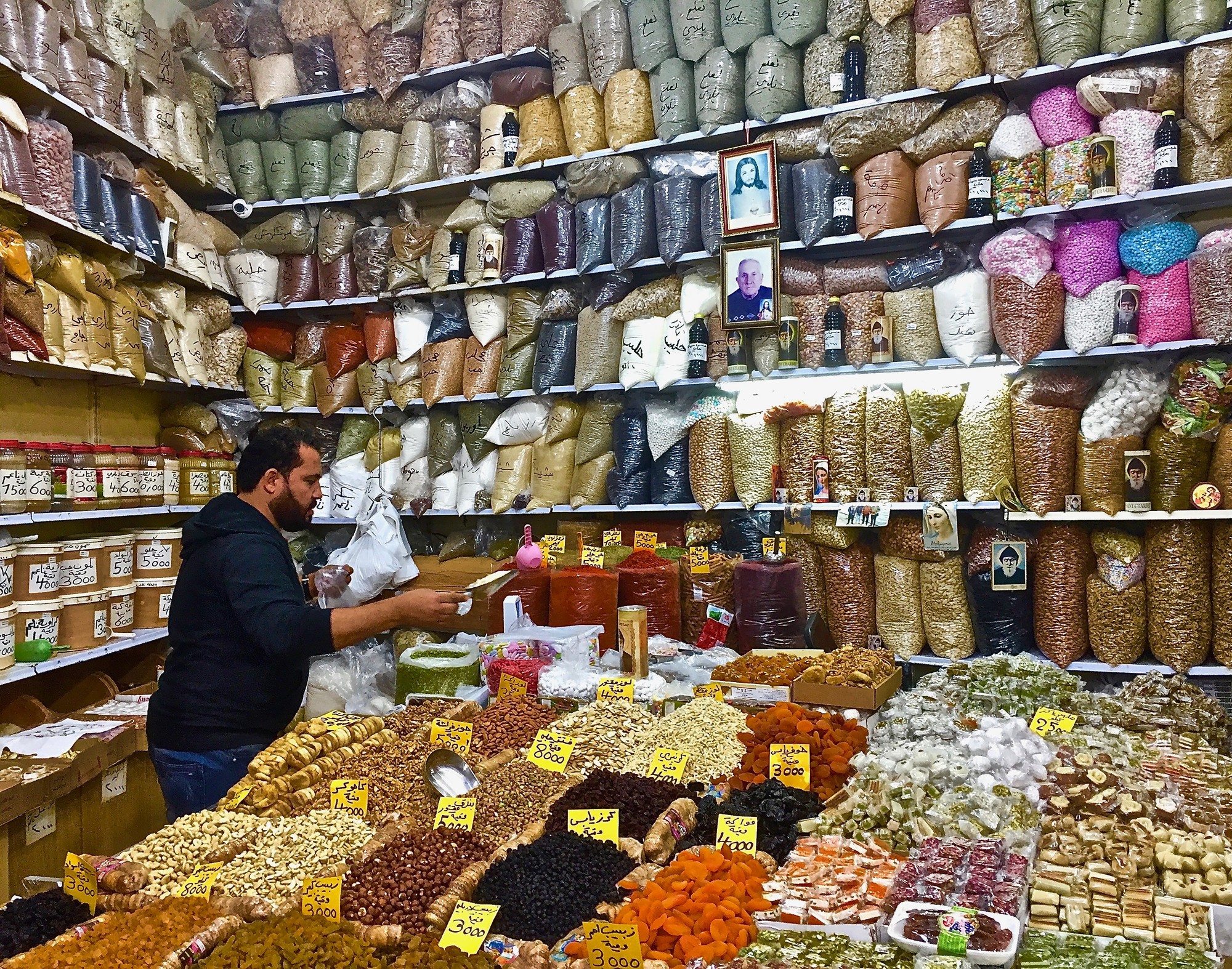 A spice market with a shop keeper