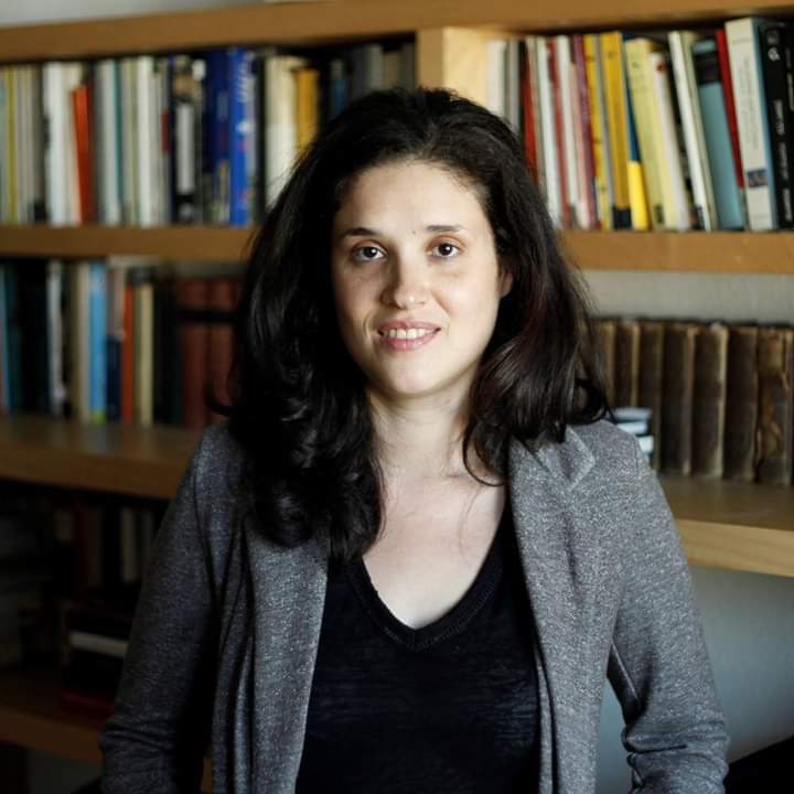 a photo of Yael Almog in her study