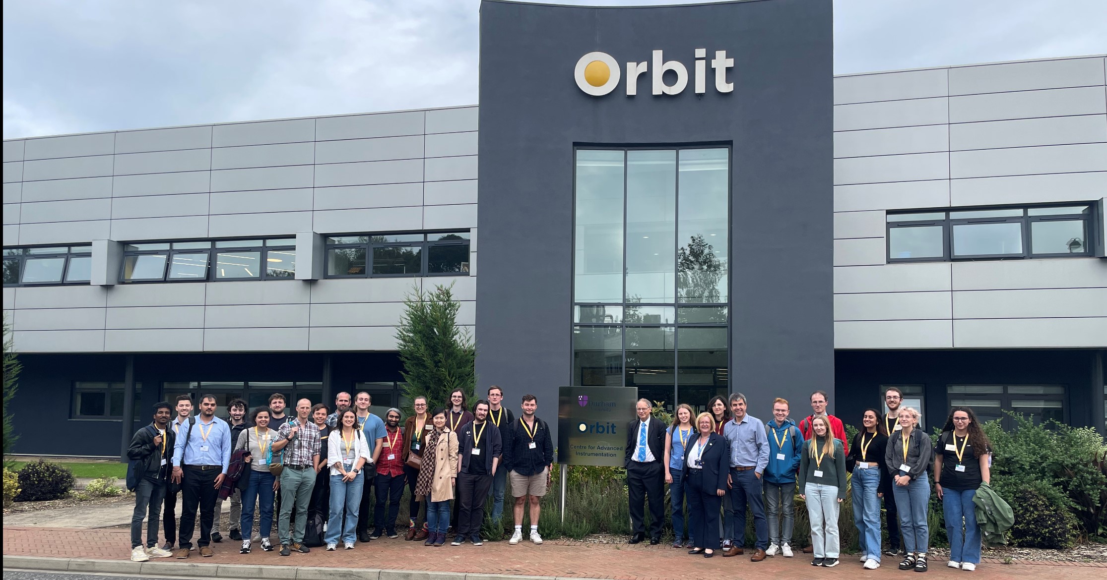 Space summer school participants group photo outside orbit building