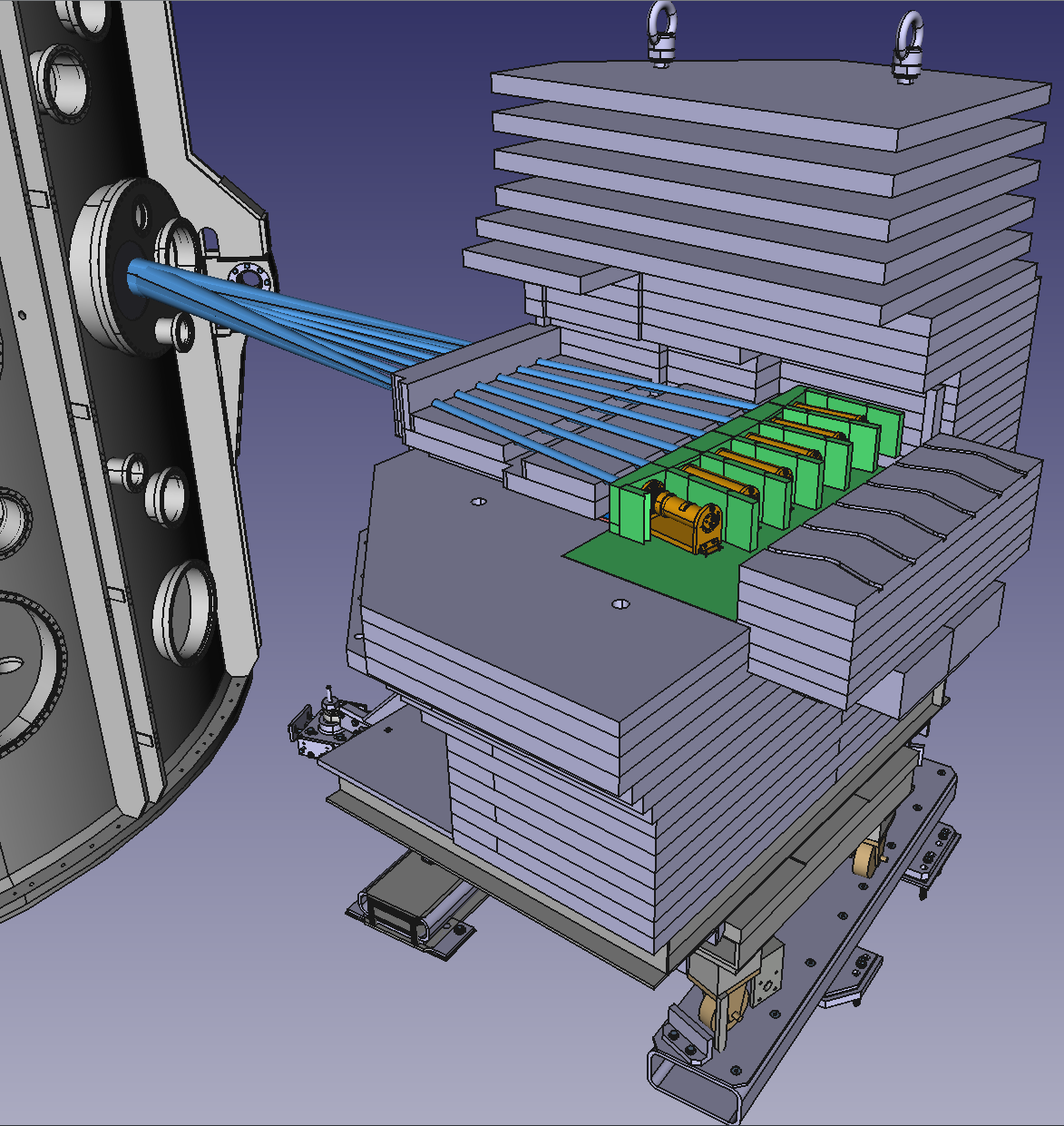 View of the Neutron Camera  Upgrade installed at MAST Upgrade: neutron shield (in gray), gamma-rays  shield (in green), neutron detectors (orange) and fields of view (in  blue). The NCU is in operation on MAST Upgrade since 2021.