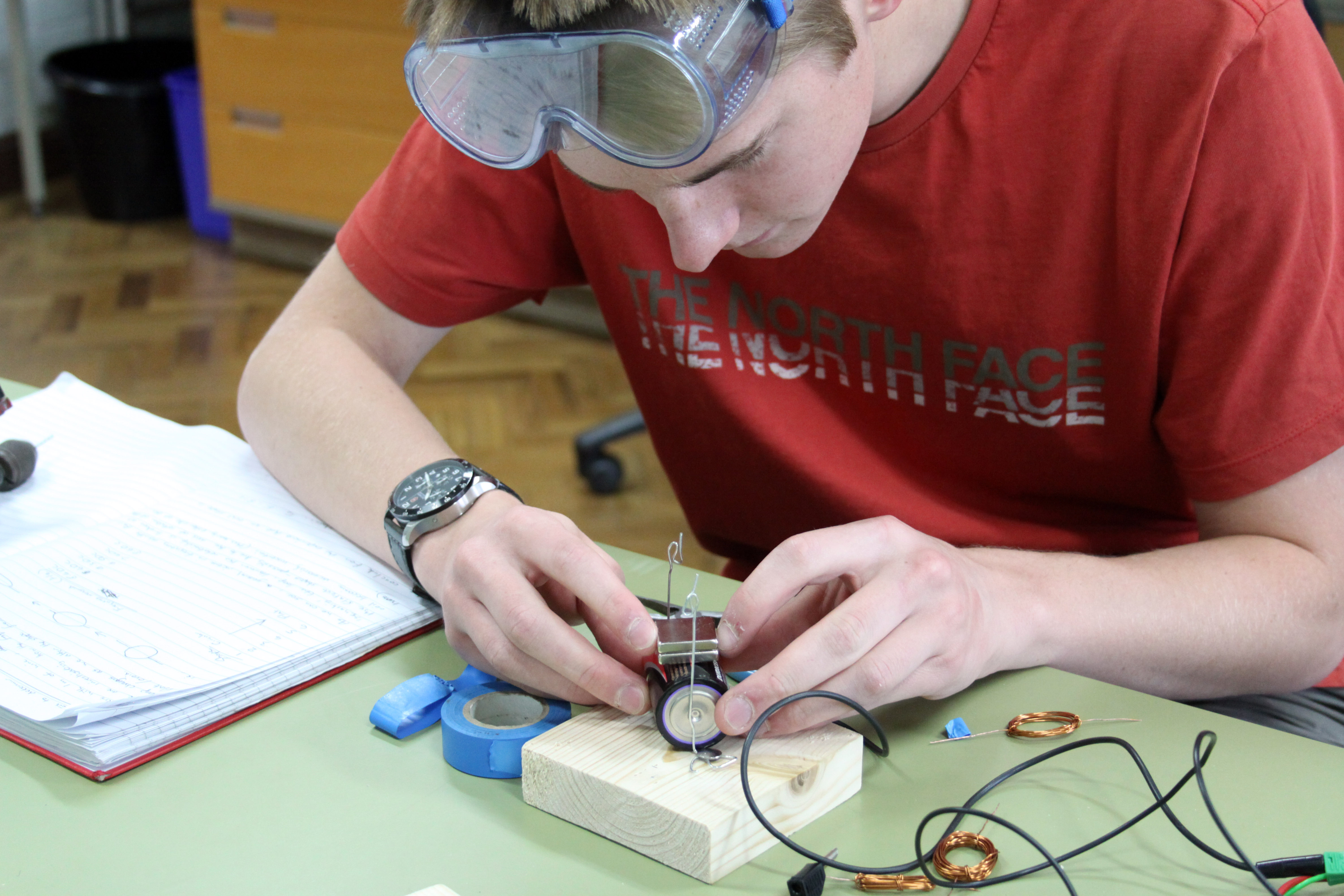 Bridge project student builds a motor from paperclips