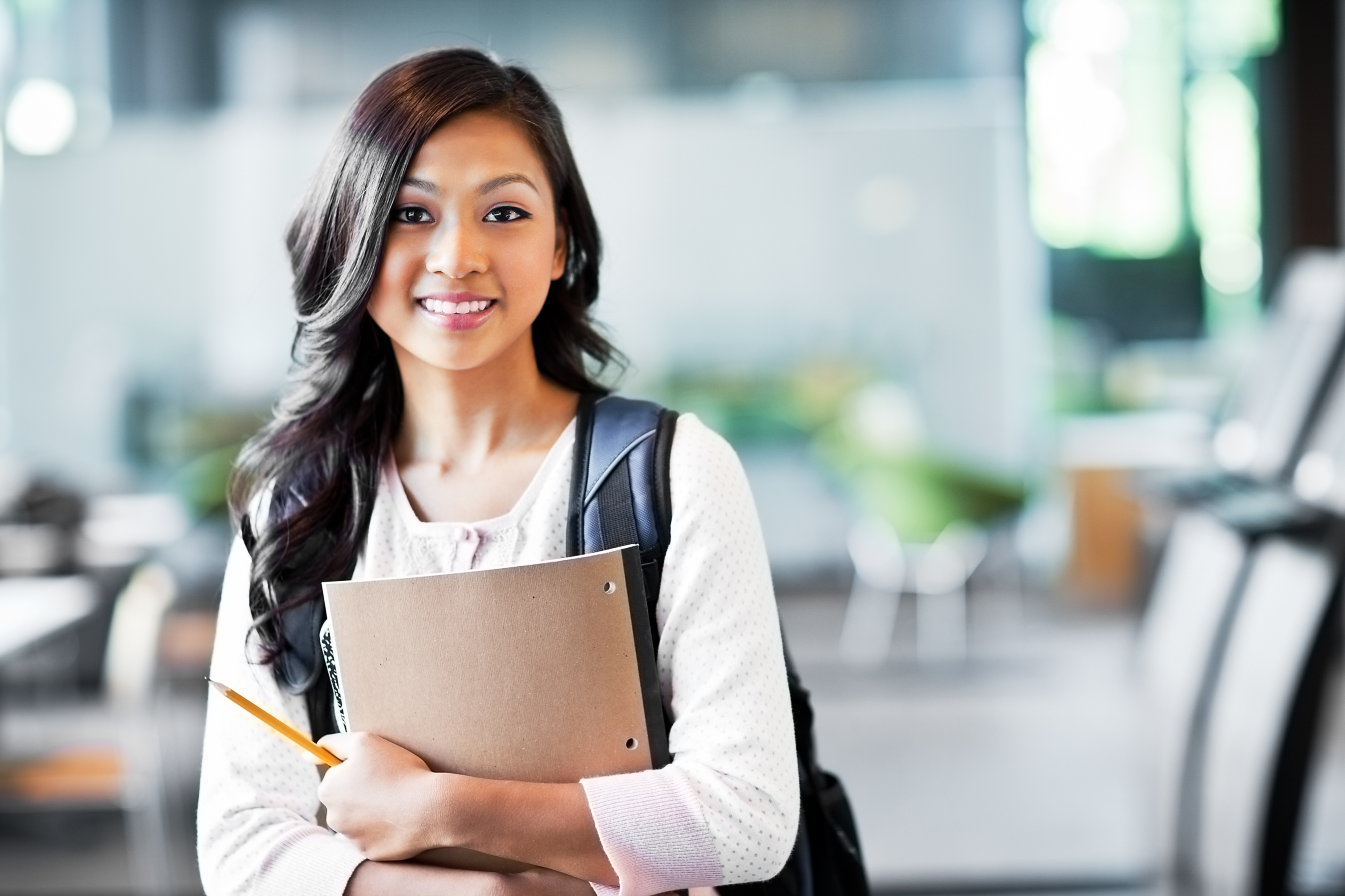 A portrait of a student on campus