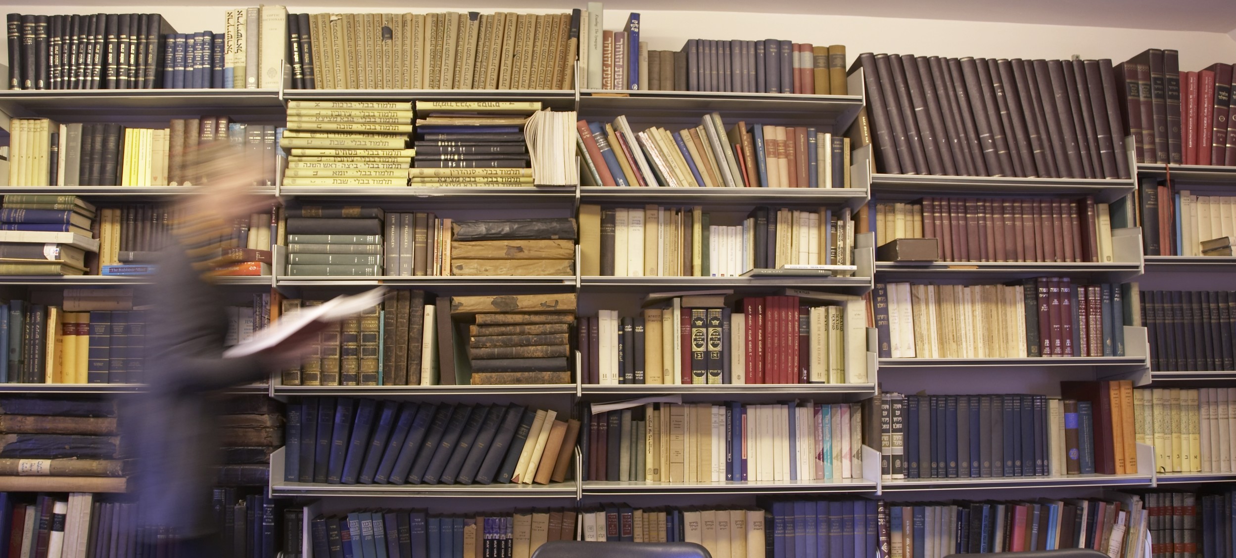 Shelves of books from theology and religion