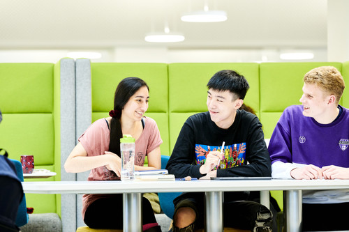 three Students working together