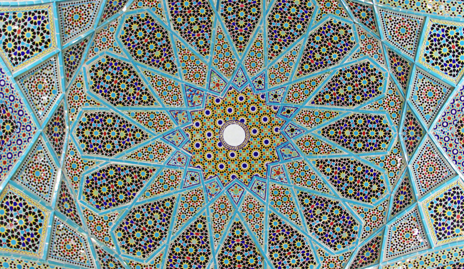 The ornate tiled ceiling of the Tomb of Hafez pavilion