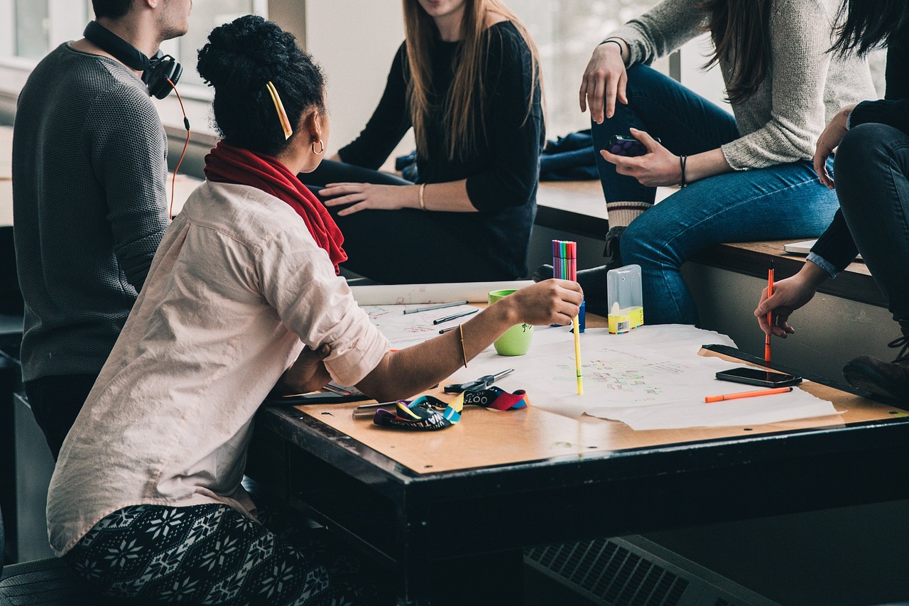 A group of students sitting around a table