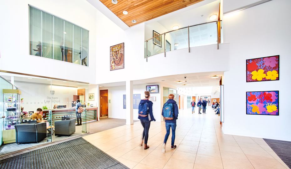 Busy entrance lobby of Durham Law School