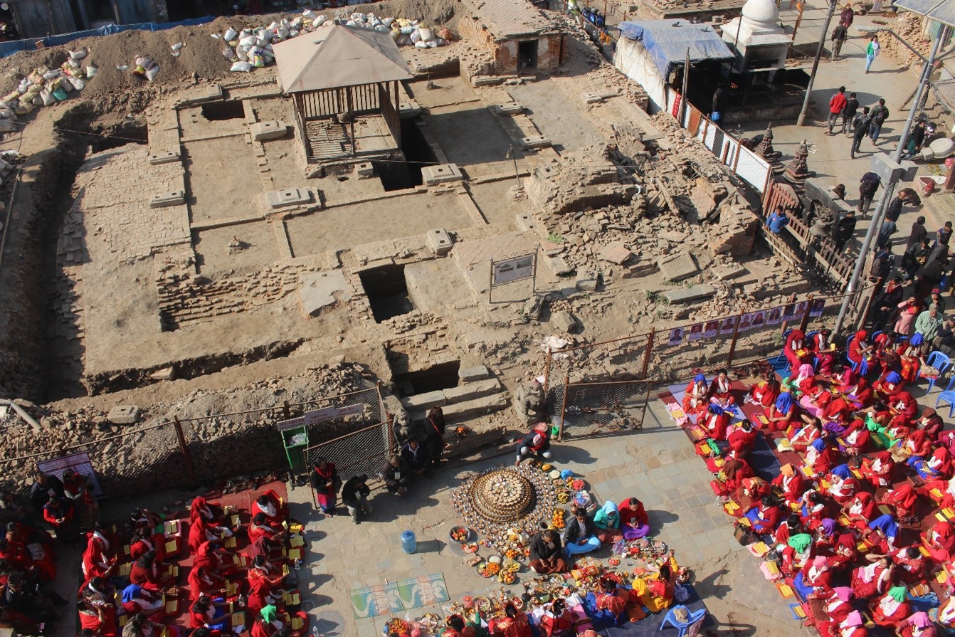 Worshippers gather at the Kasthamandap in Kathmandu to re-venerate the monument after its collapse