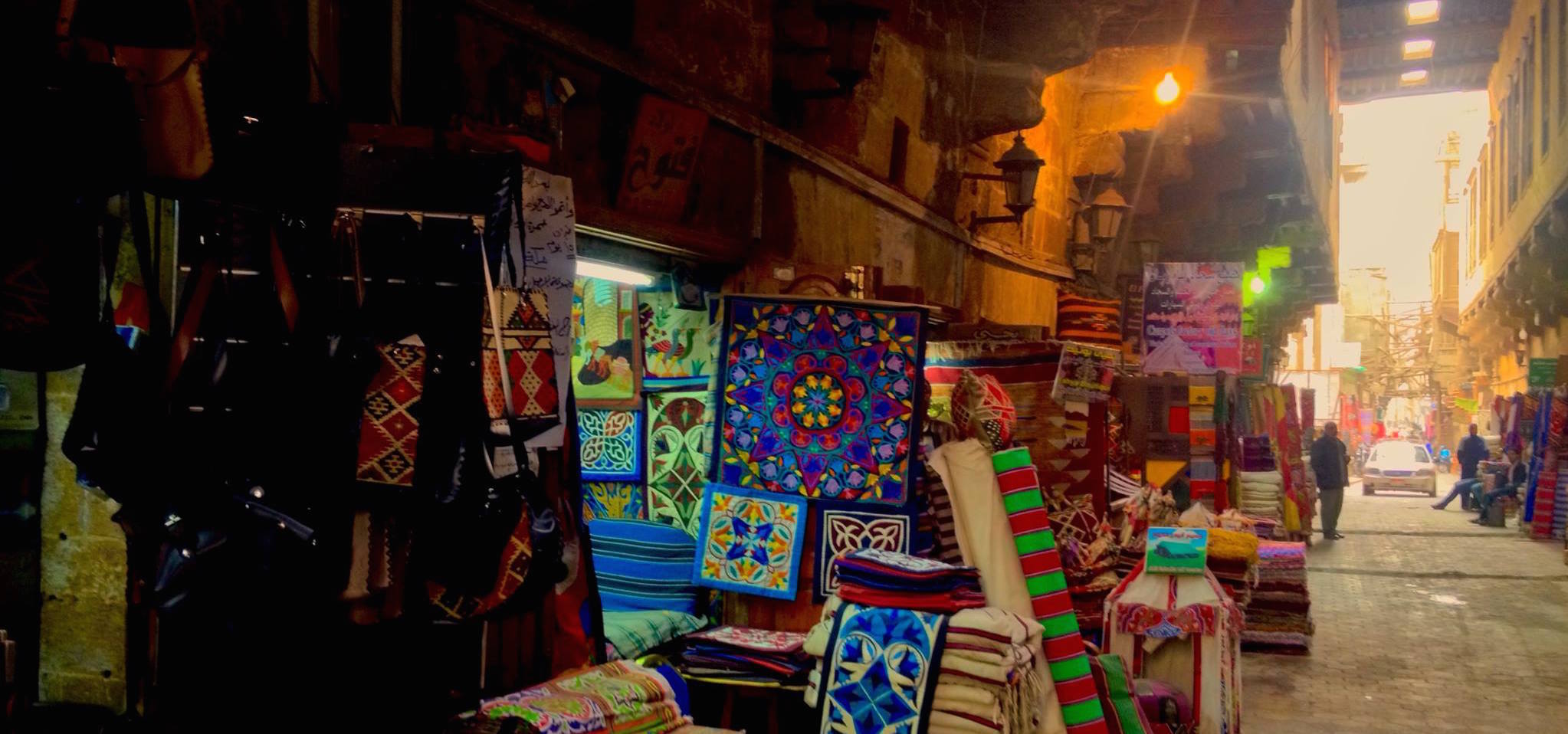 Market stall showcasing colourful textiles