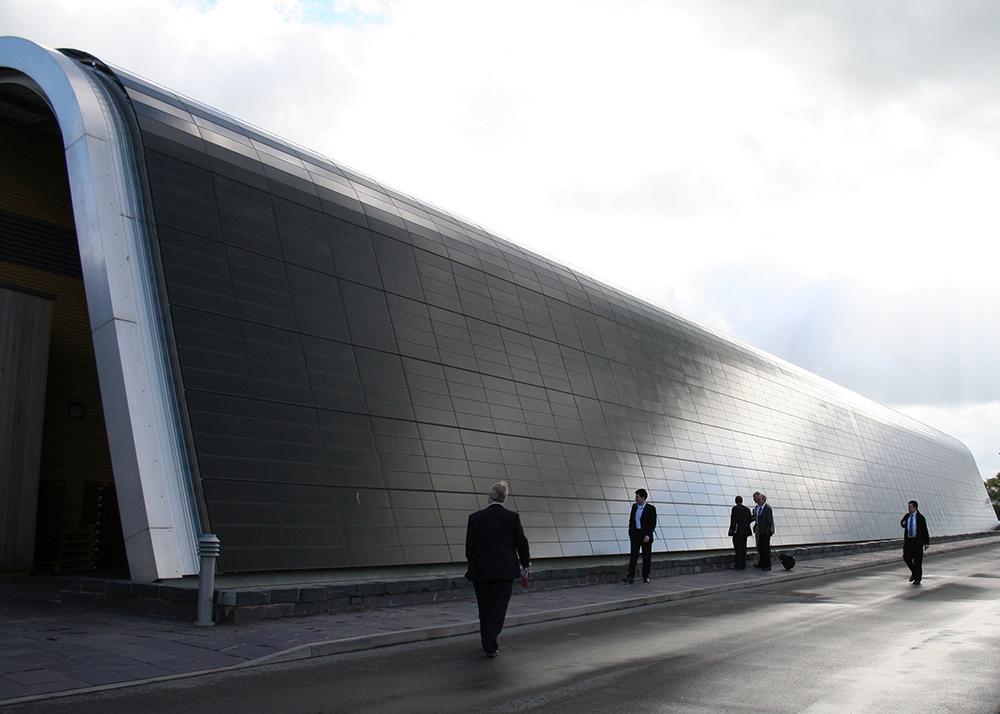 A futuristic building covered in solar cells