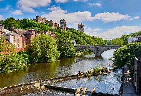 a view of the cathedral and river