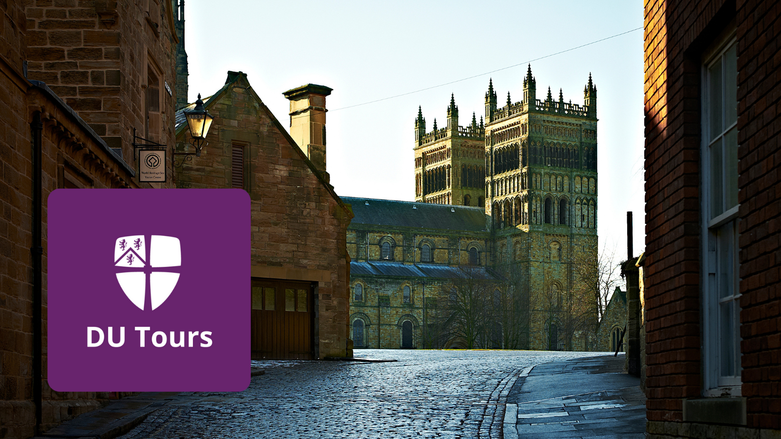 Cathedral viewed from Owengate with Durham Tours purple app logo in left corner