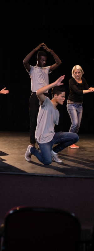 Students performing on stage