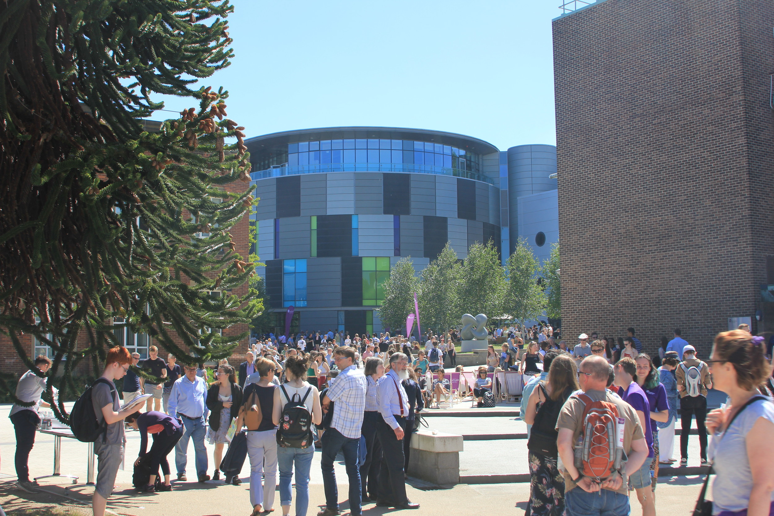 TA crowd of parents and new students exploring Durham campus