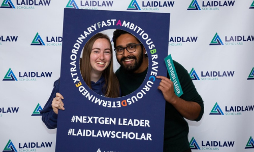 Male and Female student looking through a Laidlaw frame