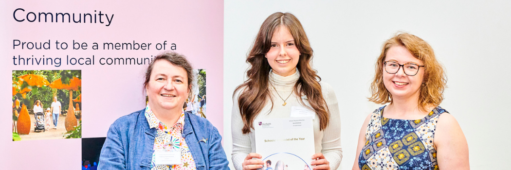 Student receiving a school's physicist of the year award