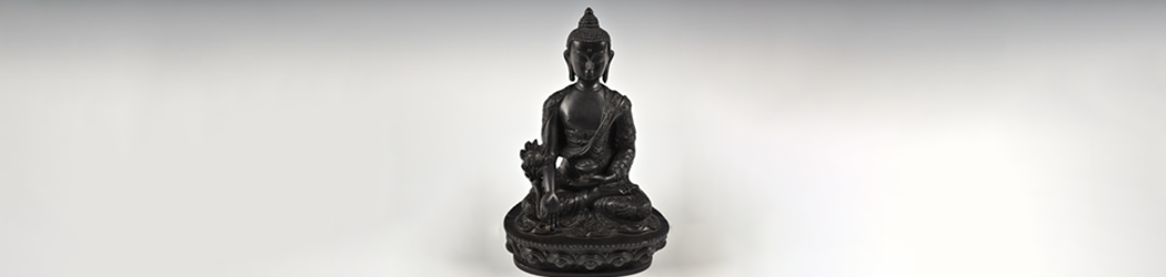 Black seated statue of Buddha
