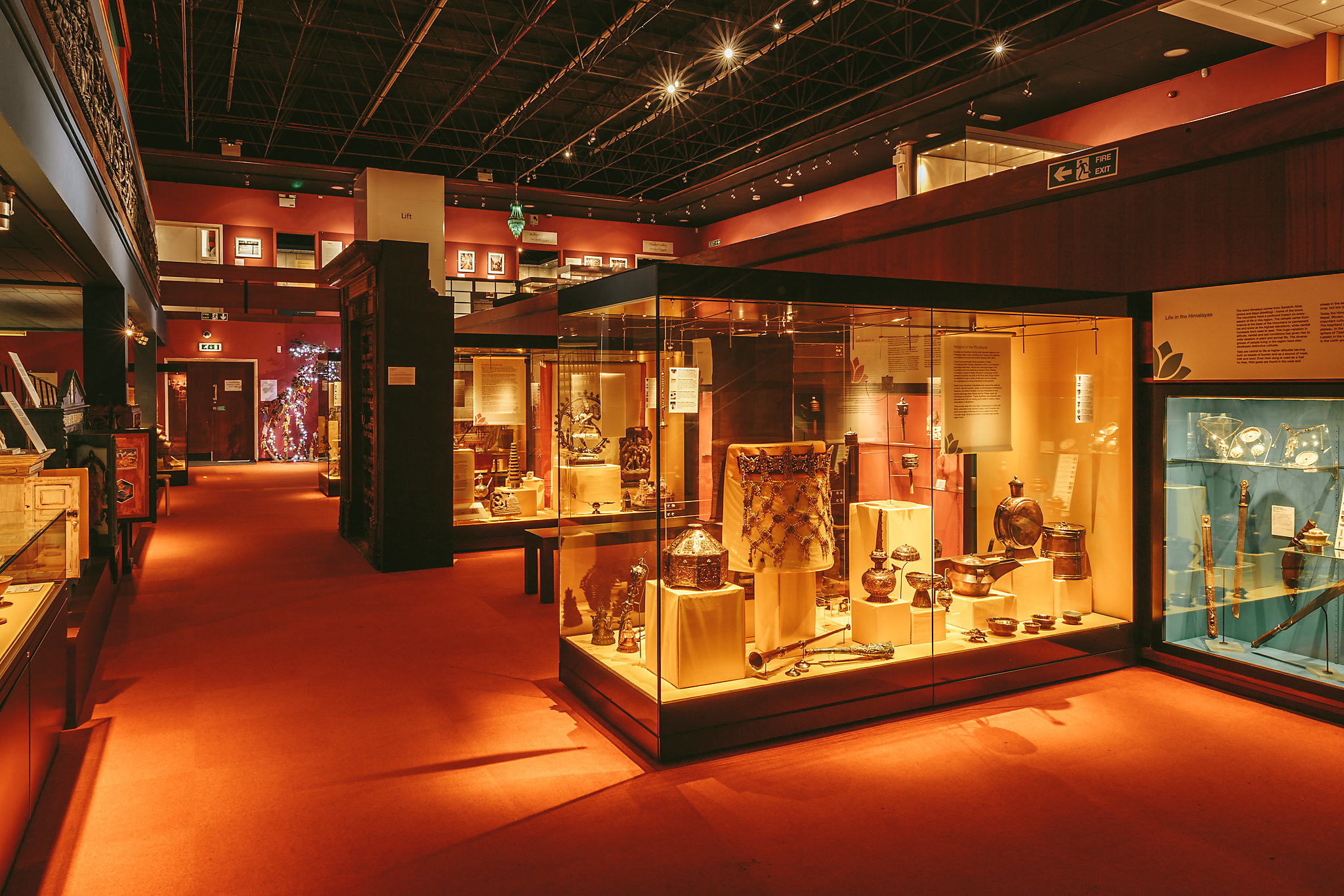 View down the length of the gallery with the Himalayan displays in front and Indian displays behind.